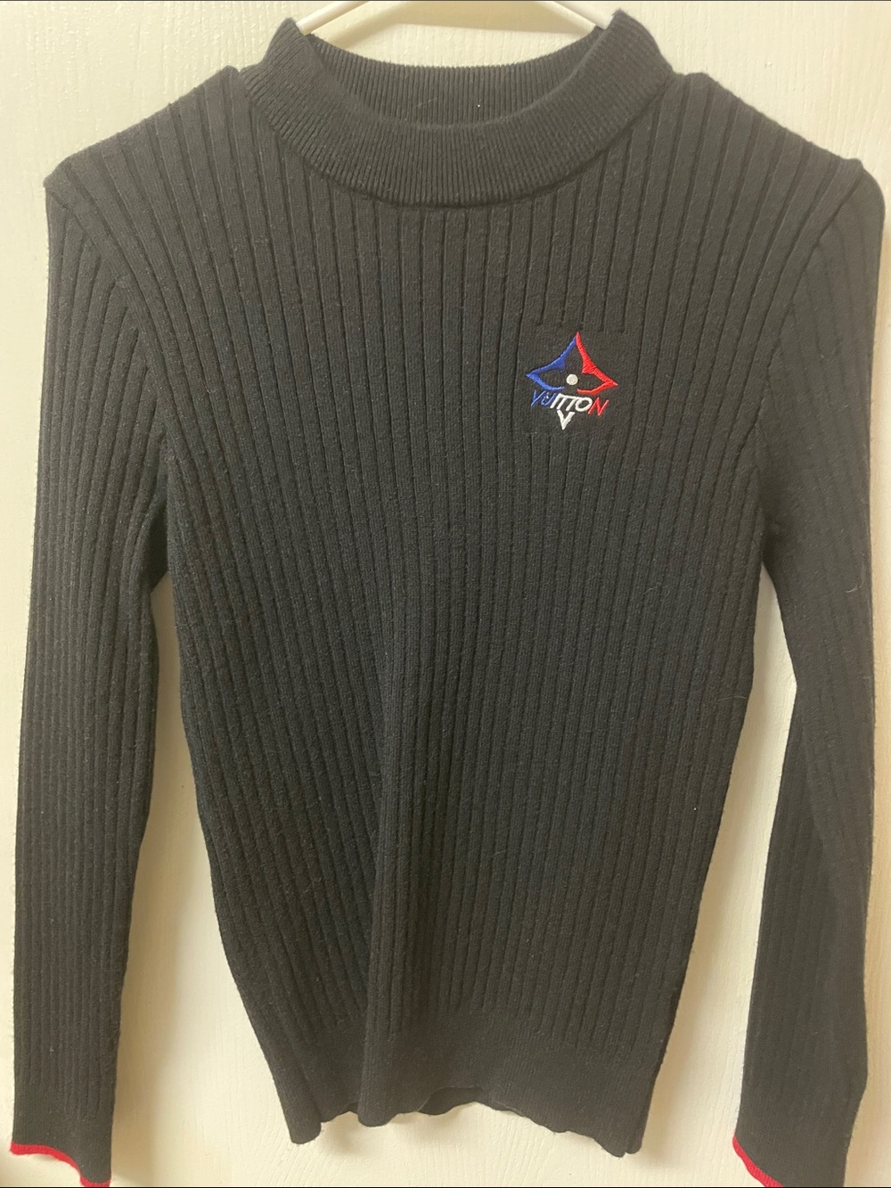 Louis Vuitton Black Ribbed Turtleneck Sweater with Red & Blue Logo